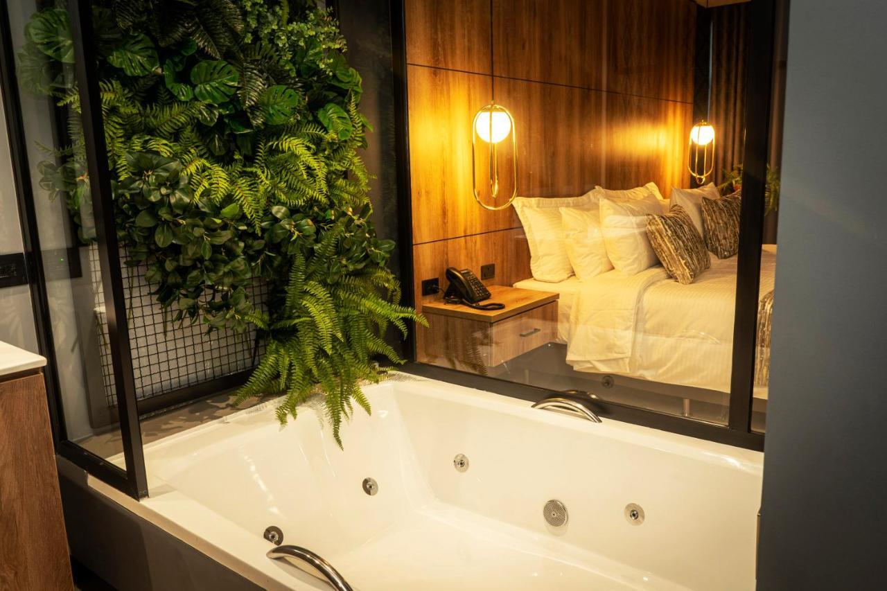 Cavalta By Bernalo Hotels Medellin Exterior photo A bathtub in a hotel room